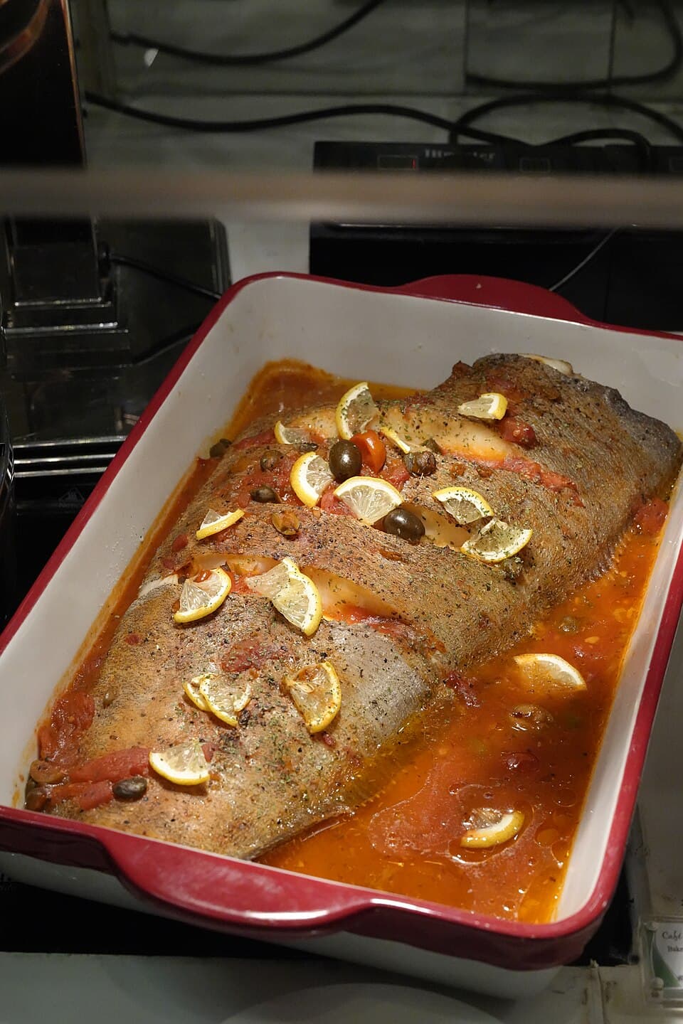 Foto de Tilapia al horno con tomates