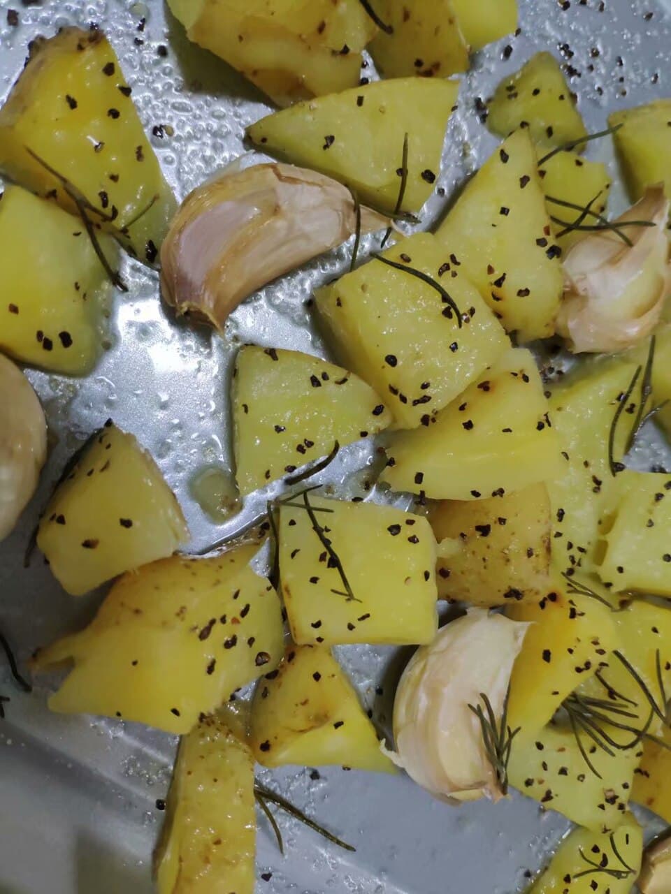 Foto de Patatas al horno con romero y ajo